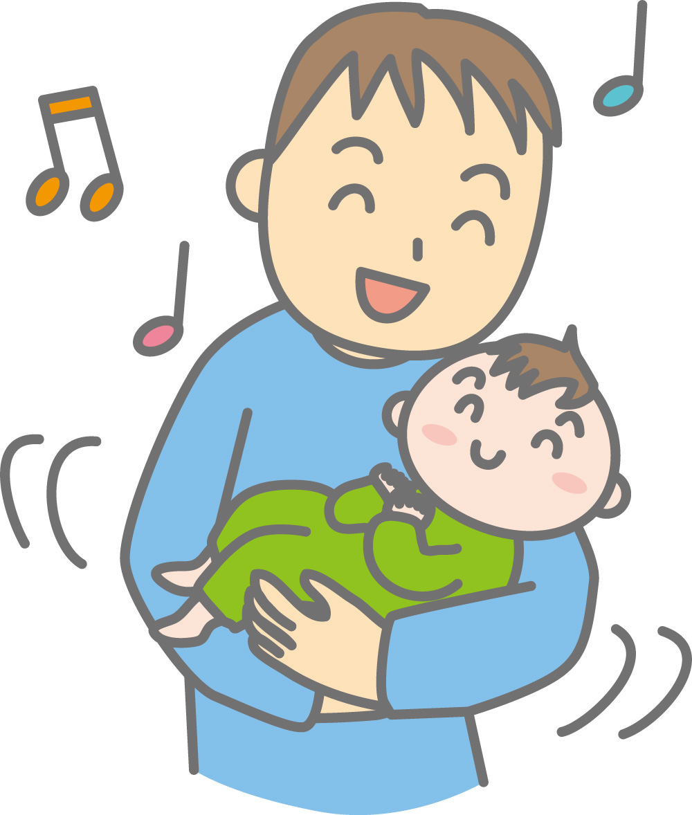 赤ちゃんを抱いている保護者