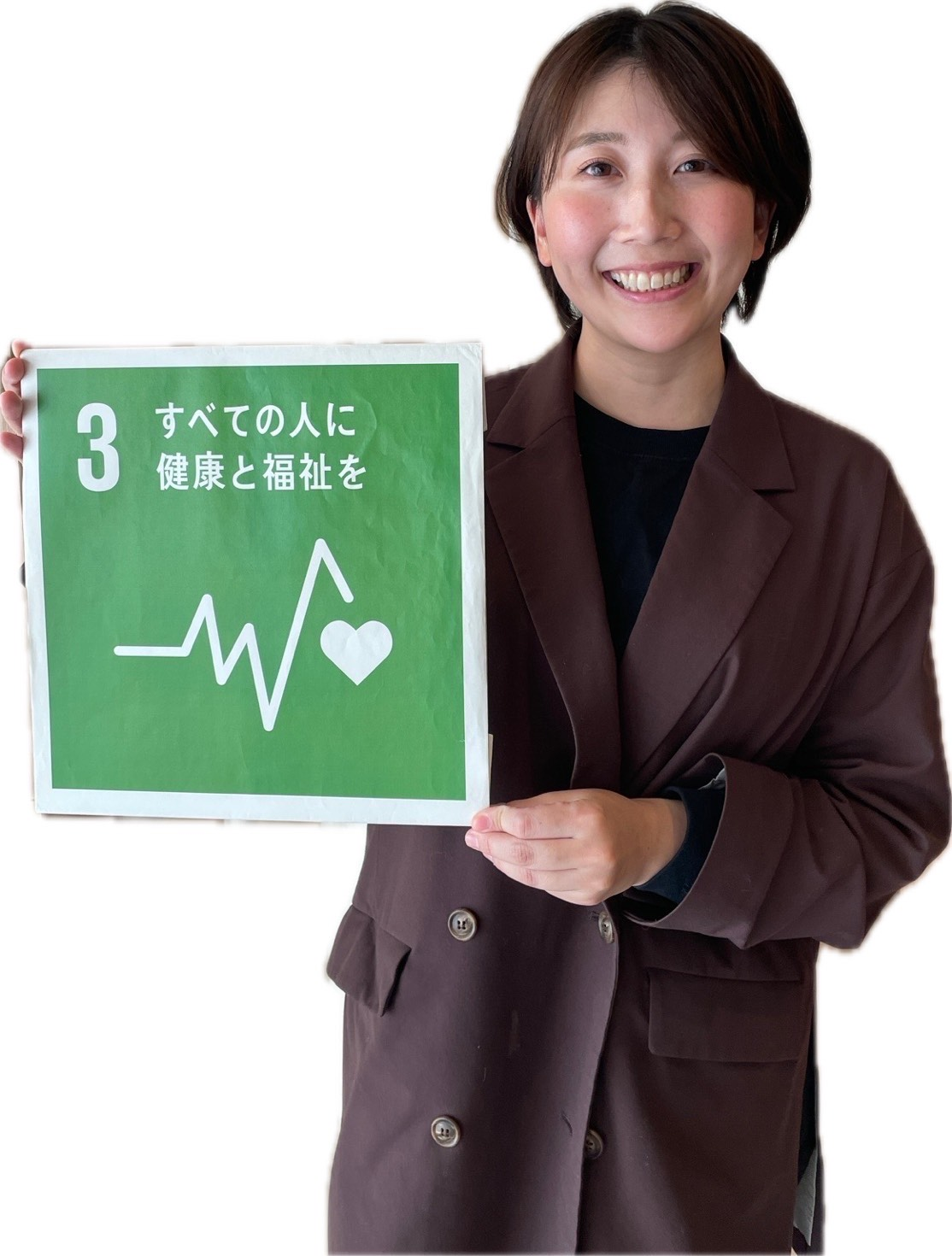 CEOの西山夏実さんがSDGsの3番のボードを持っている写真