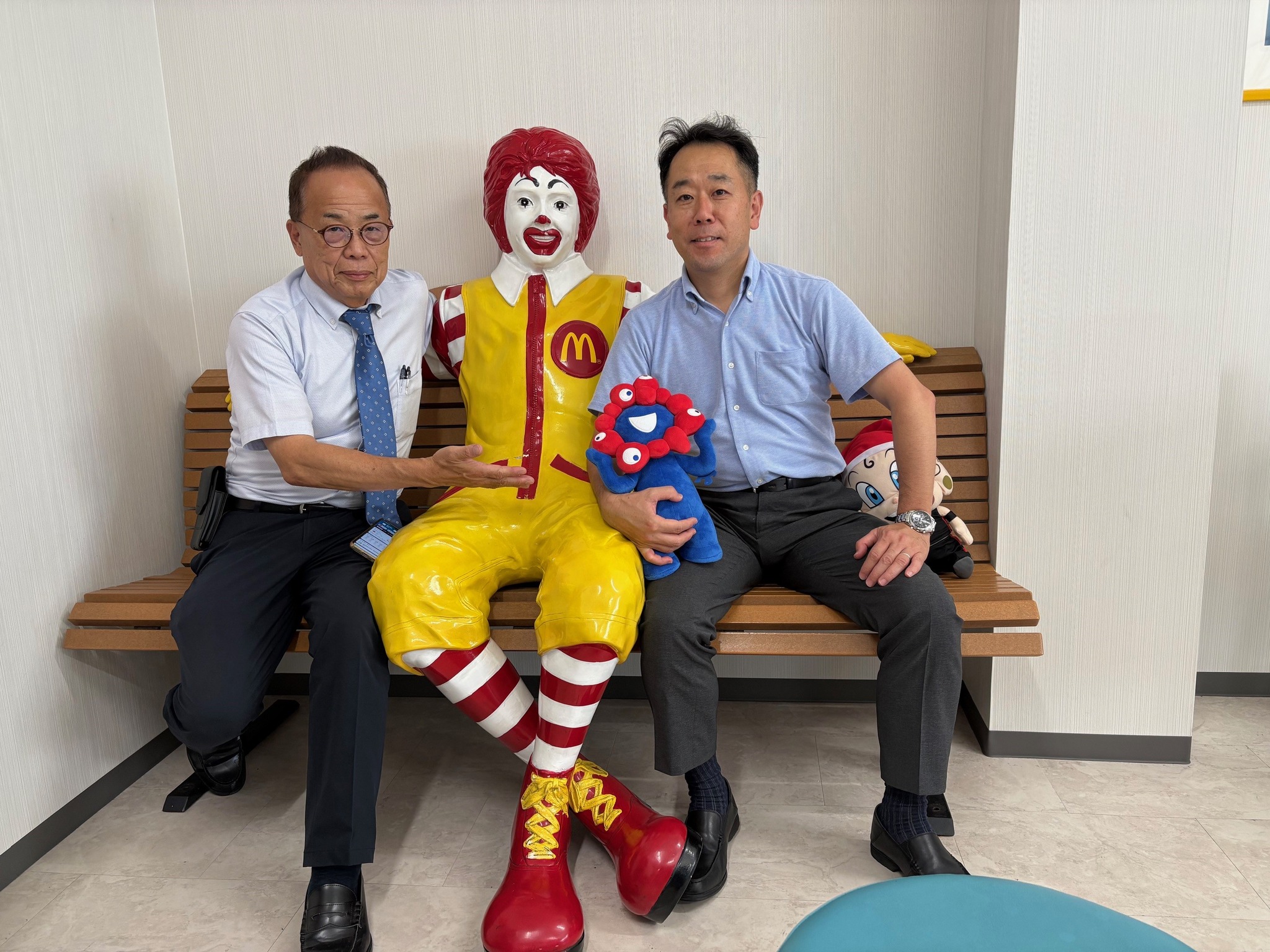 代表取締役久米様と藤井区長の写真