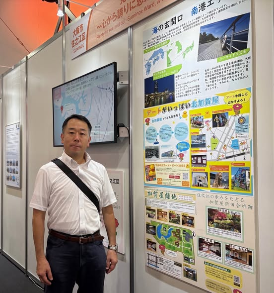 展示と区長の写真